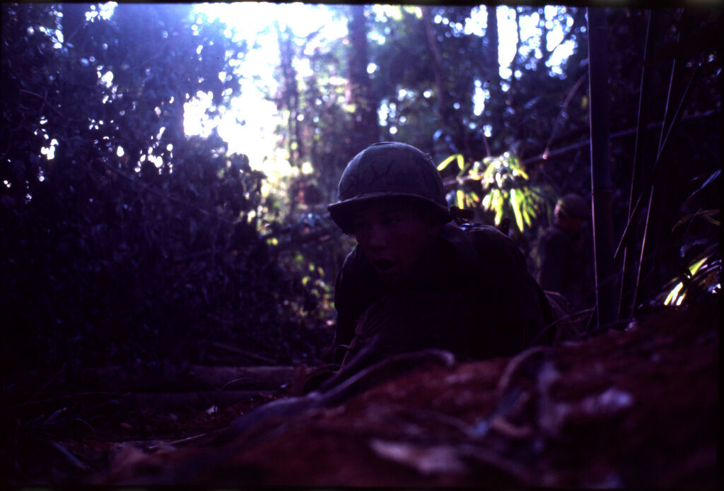 Untitled (Soldier Laying On Ground, On Watch In Jungle During Fighting In Central Highlands Near Dak To, Vietnam)