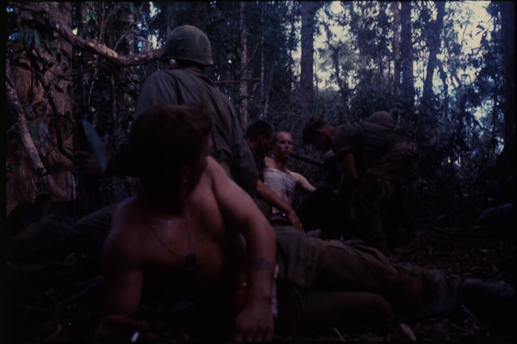 Untitled (Wounded Soldier Carried To Aid Station During Fighting In Central Highlands Near Dak To, Vietnam)