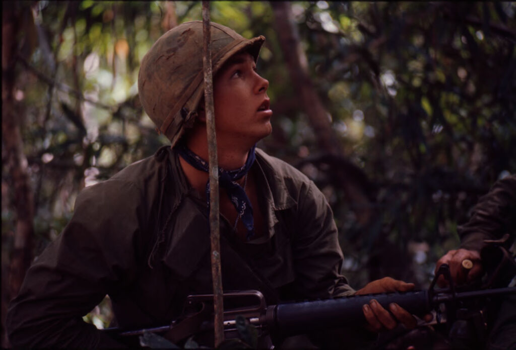 Untitled (Soldier Looking Into Trees During Fighting In Central Highlands Near Dak To, Vietnam)