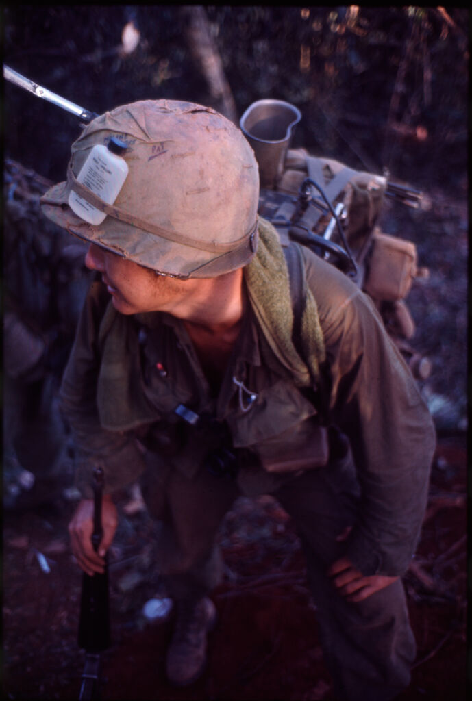Untitled (Soldier In Combat Gear Hiking Though Jungle, Central Highlands Near Dak To, Vietnam)
