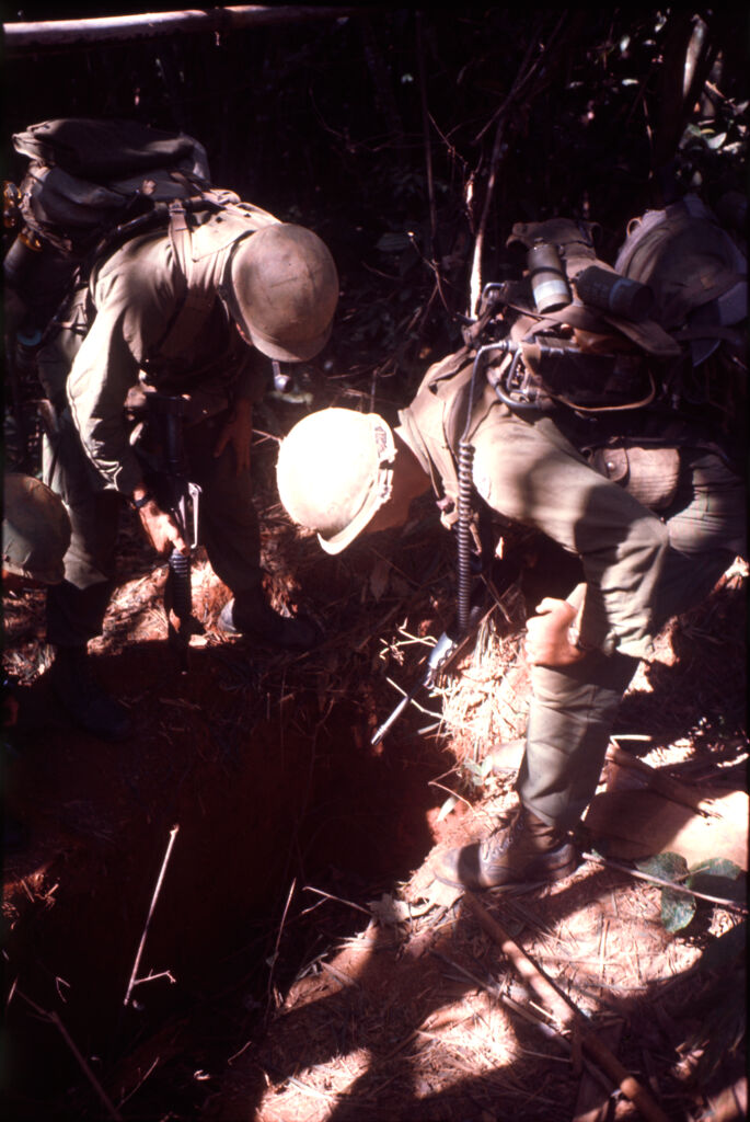 Untitled (Soldiers Examining Bunker Found In Jungle, Central Highlands Near Dak To, Vietnam)