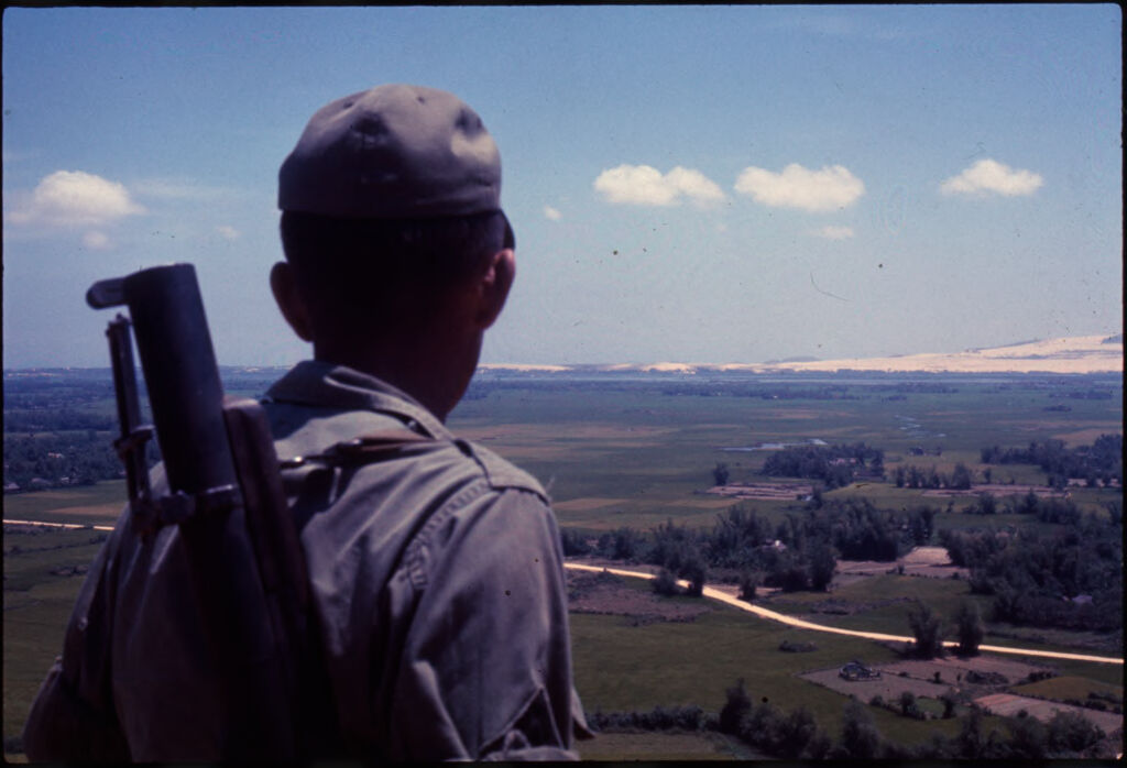 Untitled (Soldier Looking Out Over Landscape, Vietnam)