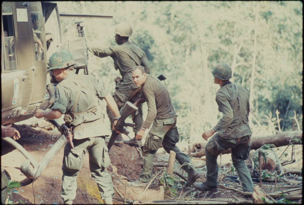 Untitled (Soldiers By Helicopter In Jungle, Central Highlands Near Dak To, Vietnam)