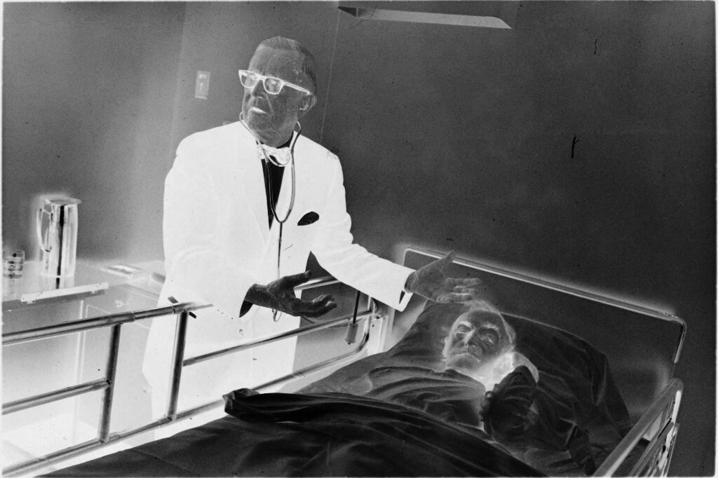 Untitled (Dr. Herman M. Juergens Checking On Patient In Hospital Bed)