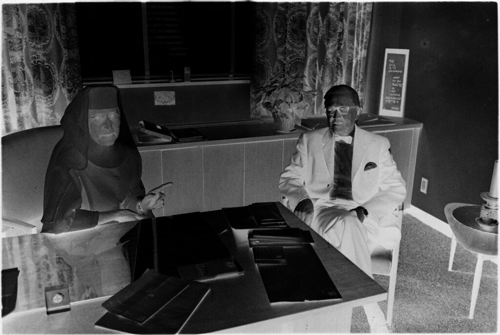 Untitled (Dr. Herman M. Juergens And Nurse Seated At Desk)