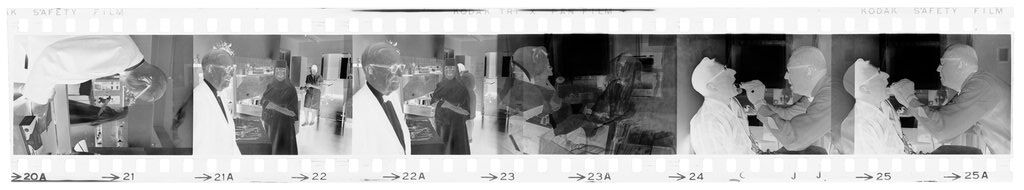 Untitled (Dr. Herman M. Juergens, In Work Area; Examining Patients)