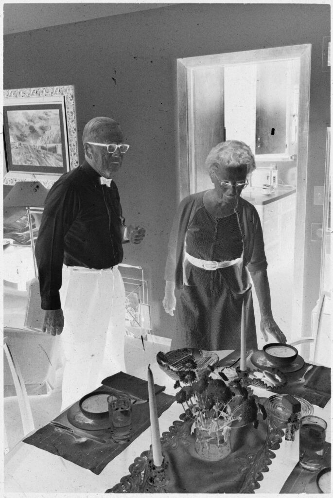 Untitled (Dr. Herman M. Juergens And Wife(?), Leona, Standing By Dining Room Table)