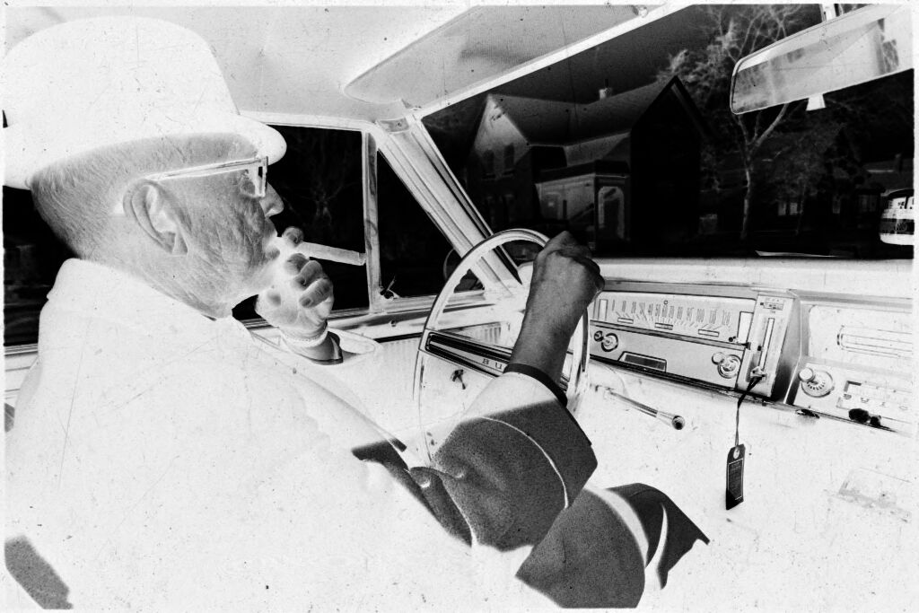 Untitled (Dr. Herman M. Juergens Driving Car And Smoking Cigar)