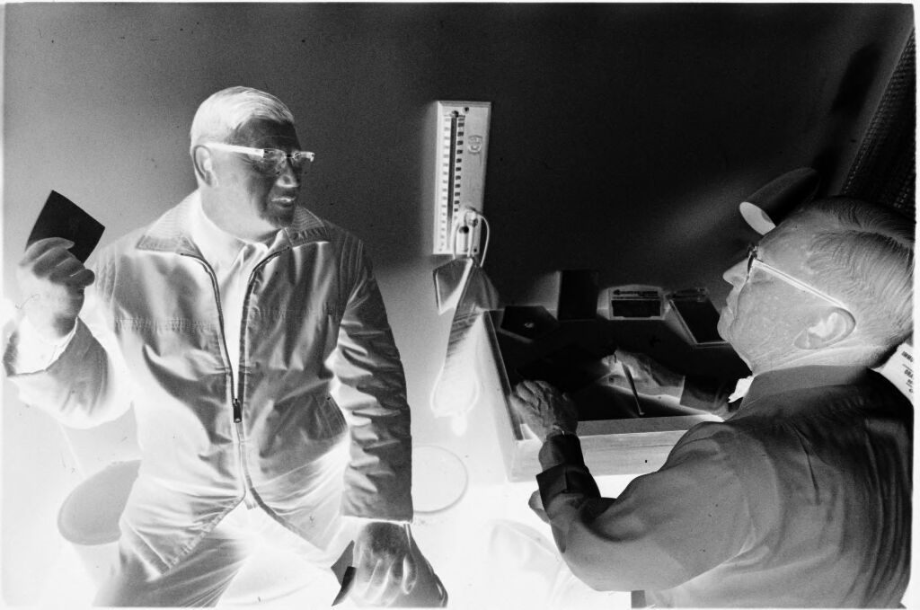 Untitled (Dr. Herman M. Juergens Talking With Patient In Exam Room)