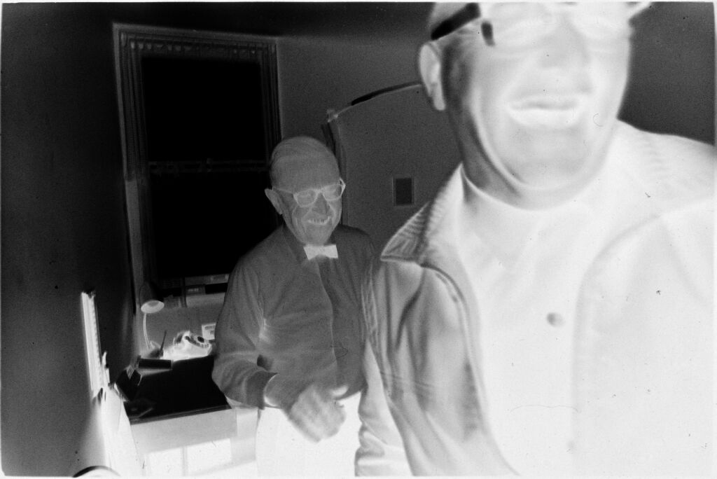 Untitled (Dr. Herman M. Juergens Laughing With Patient After Appointment)