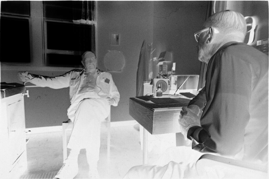 Untitled (Dr. Herman M. Juergens And Patient Talking In Exam Room)