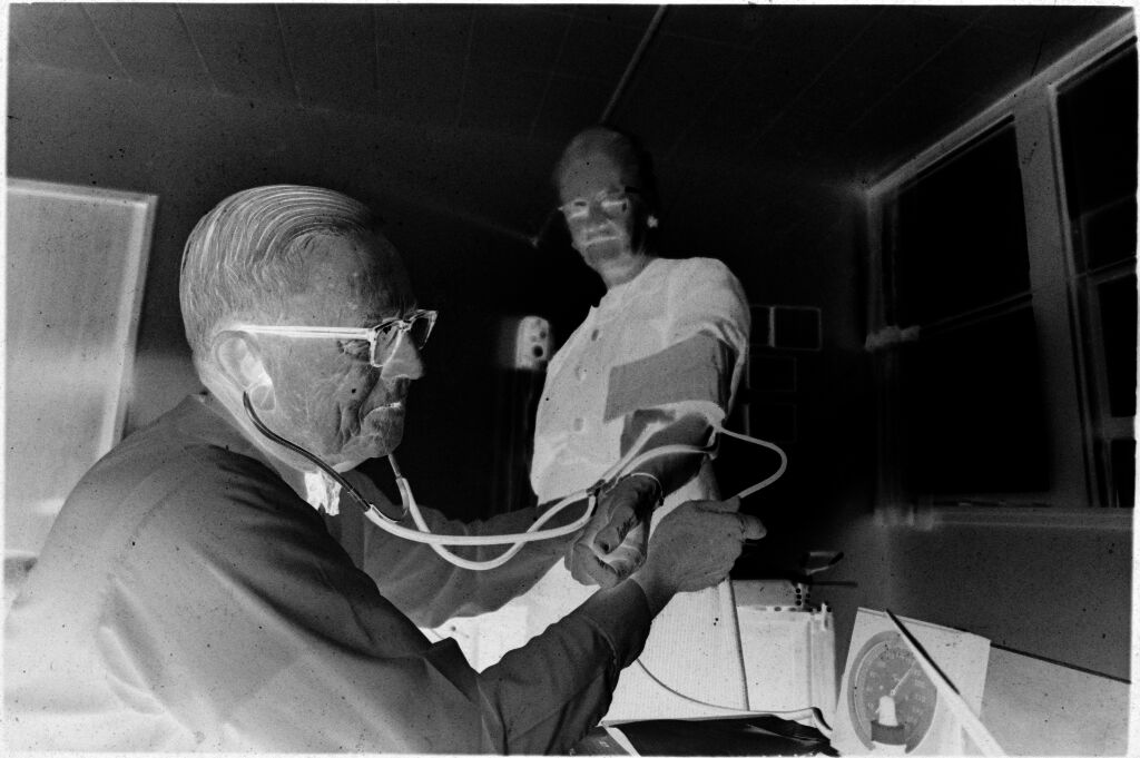 Untitled (Dr. Herman M. Juergens Checking Patient's Blood Pressure)