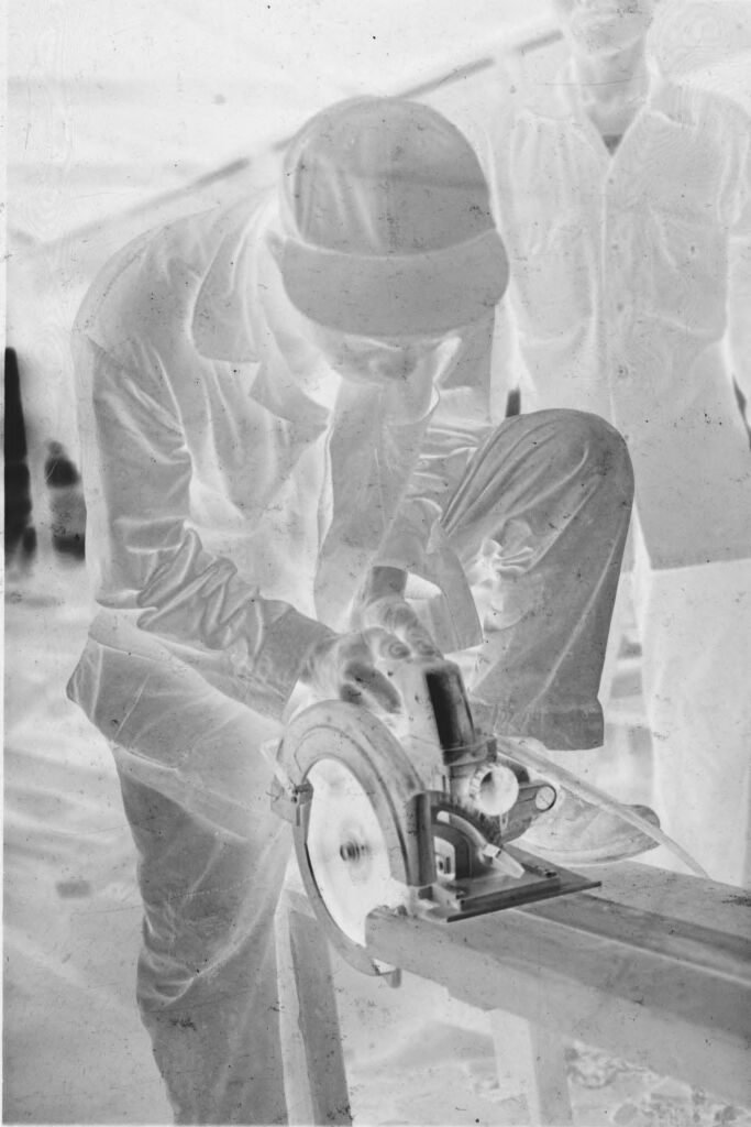 Untitled (Vietnamese Soldier(?) Working With Circular Saw, Vietnam)