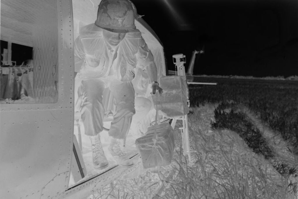 Untitled (Soldier Stepping Out Of Side Of Helicopter, Vietnam)