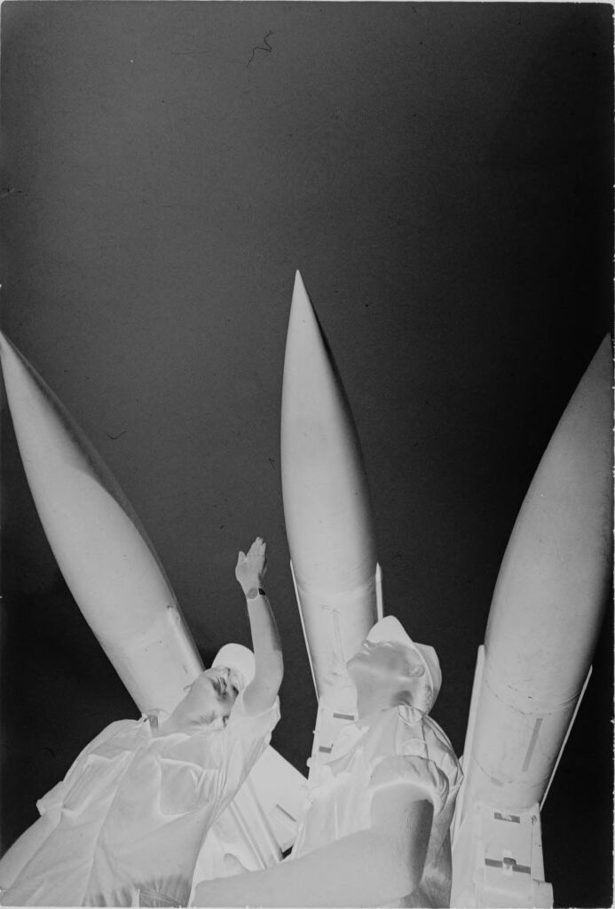 Untitled (Worm's-Eye View Of Soldiers Standing Under Hawk Missiles, Nha Trang Harbor, Vietnam)