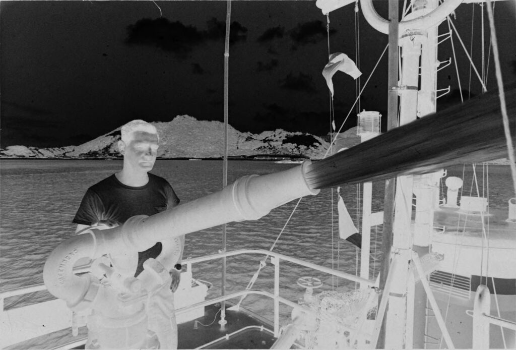 Untitled (Soldier Spraying Water From Pipe On Deck Of Ship, Vietnam)