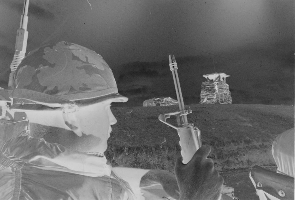 Untitled (Soldier In Combat Helmet In Back Of Truck, Vietnam)