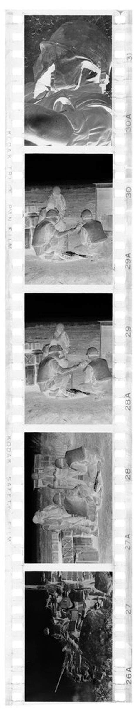 Untitled (Soldiers Resting In The Field, Vietnam)