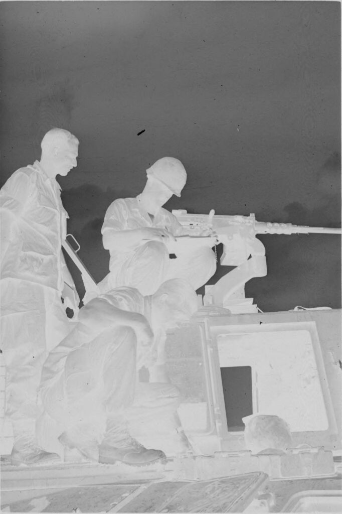 Untitled (Soldiers Checking Machine Gun On Vehicle, Vietnam)