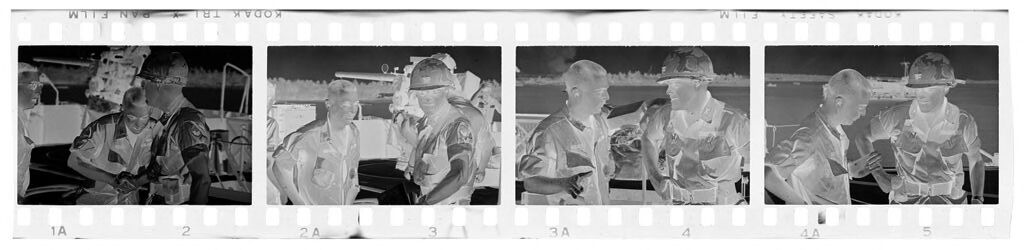 Untitled (Two Soldiers Meeting On Deck Of Ship, Vietnam)