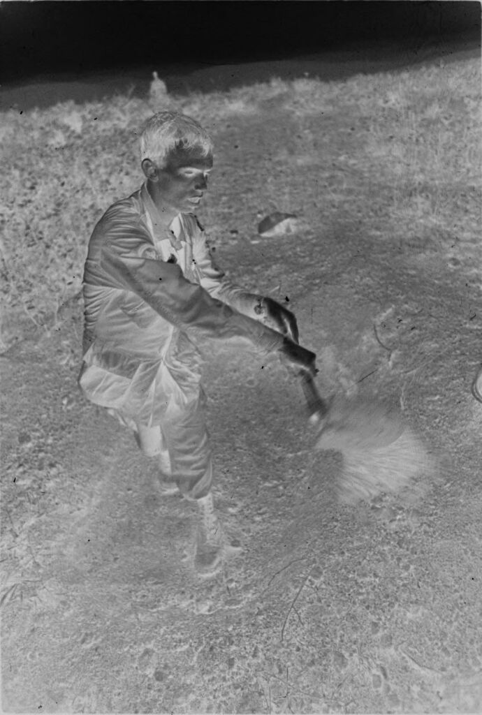 Untitled (Soldier Digging A Hole In The Dirt, Vietnam)