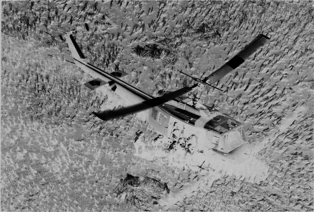 Untitled (Aerial View Of Soldiers Loading Helicopter In Field, Vietnam)