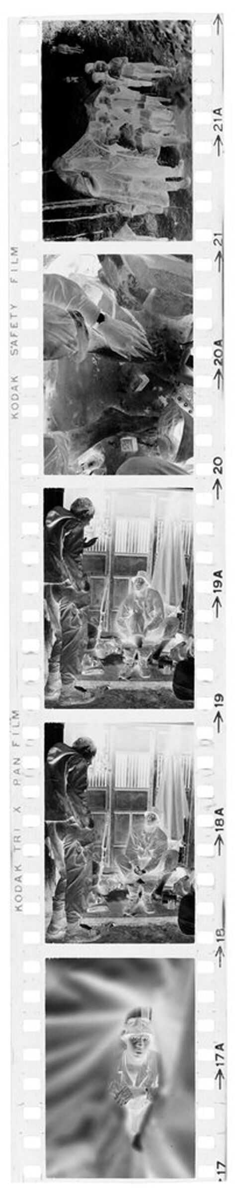 Untitled (Soldier Seated Outside Building Resting Feet; Soldier With Vietnamese Children, Vietnam)