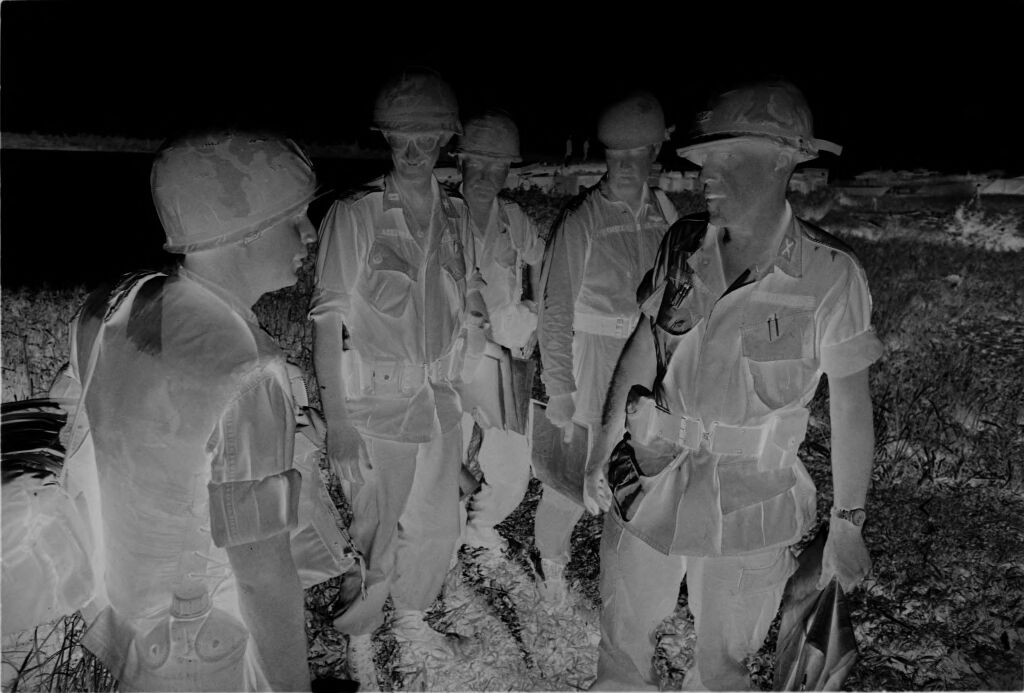 Untitled (Soldiers Meeting In Field, Vietnam)