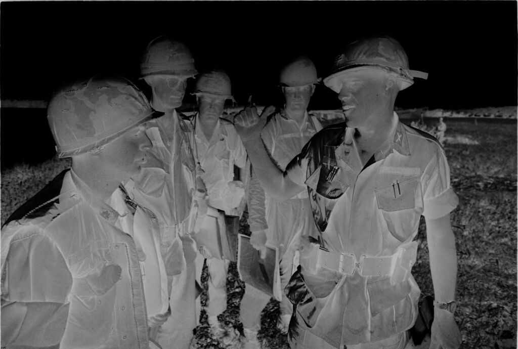 Untitled (Soldiers Meeting In Field, Vietnam)