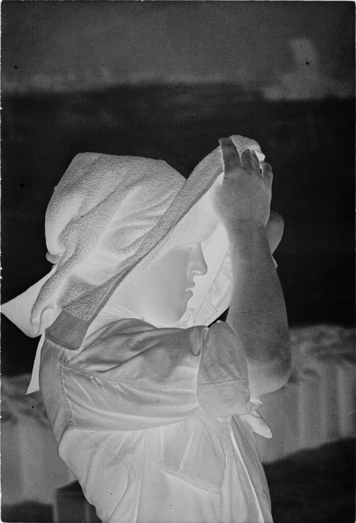 Untitled (Soldier Covering Head And Face With Towel, Vietnam)