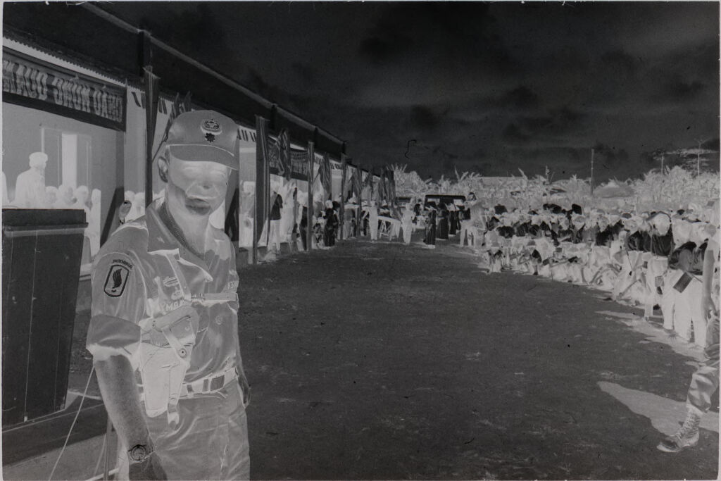 Untitled (U.s. Soldier Standing In Street Lined Crowd Of Children On One Side, Vietnam)