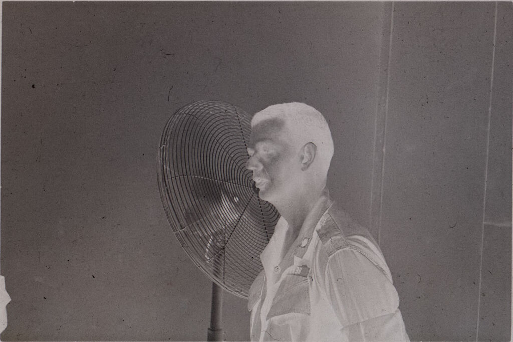 Untitled (Soldier Standing In Front Of A Fan, Vietnam)