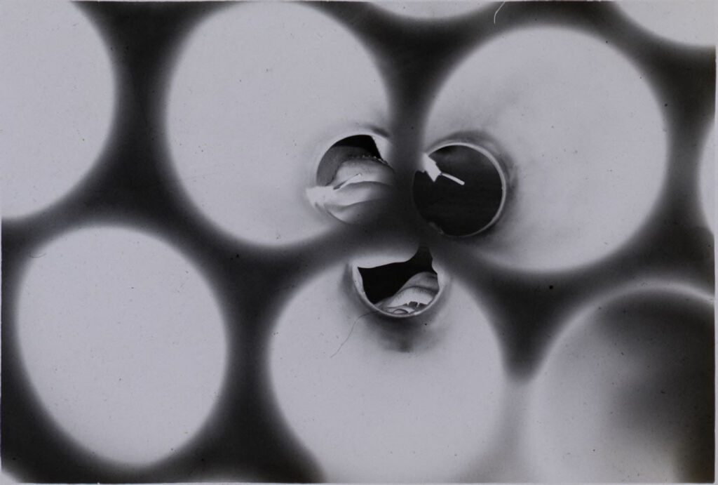 Untitled (View Through Tubes Used To Hold Ammunition, Vietnam)
