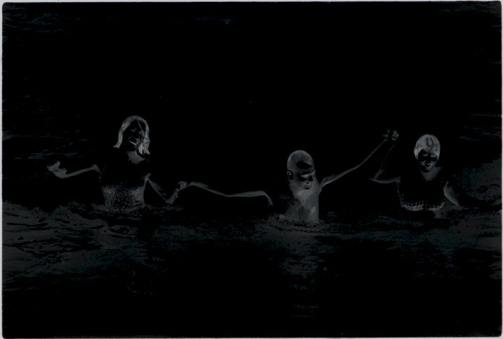 Untitled (Man And Two Women Coming Out Of The Ocean Holding Hands, Vietnam)