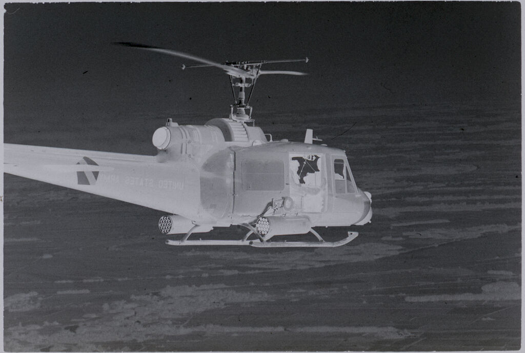 Untitled (Helicopter Gunship Flying Over Jungle South Of Saigon, Vietnam)
