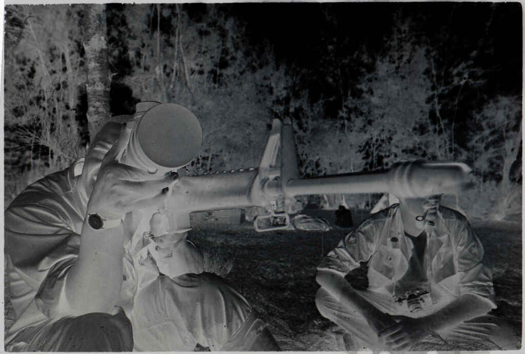 Untitled (Soldier Checking Sight On Machine Gun, Vietnam)