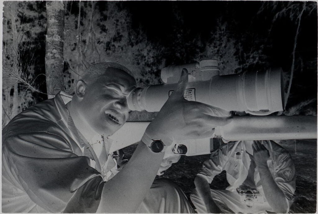 Untitled (Soldier Checking Sight On Machine Gun, Vietnam)