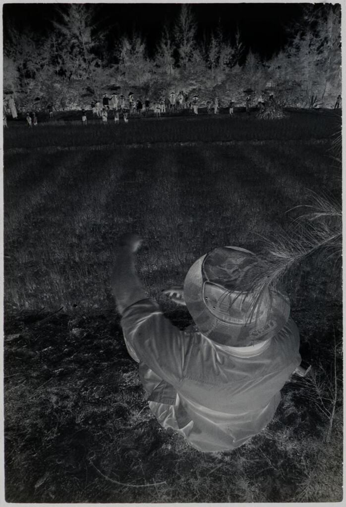 Untitled (Seated Soldier Looking Out At Field, Vietnam)
