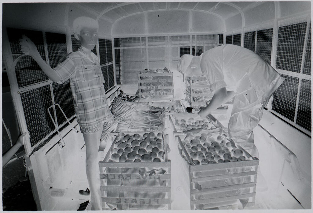 Untitled (Soldiers Examining Bins Of Produce And Shelves Of Bread, Vietnam)