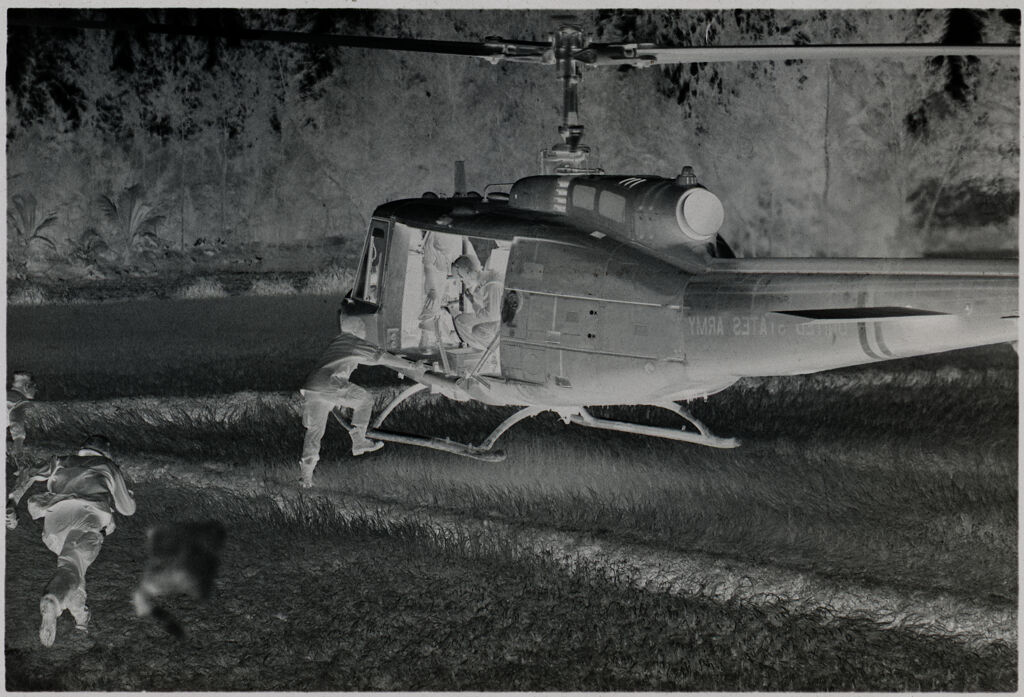 Untitled (Soldiers Guiding Landing Of Helicopter, Vietnam)