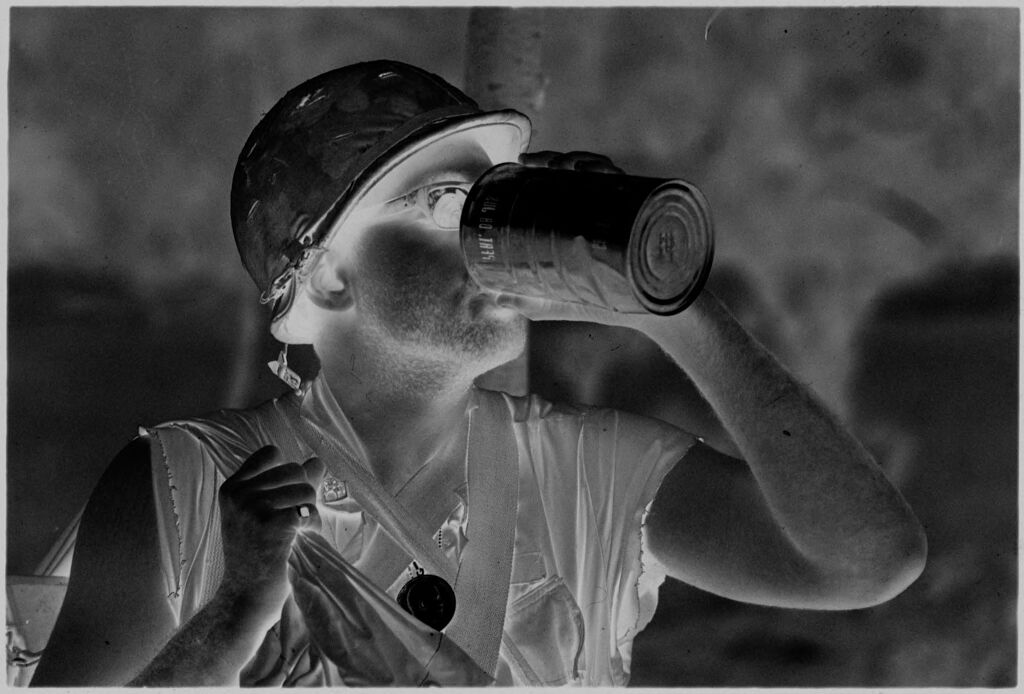 Untitled (Soldier Drinking From Metal Can, Vietnam)