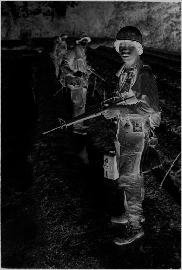 Untitled (Soldiers In Combat Attire Standing In A Field, Vietnam)