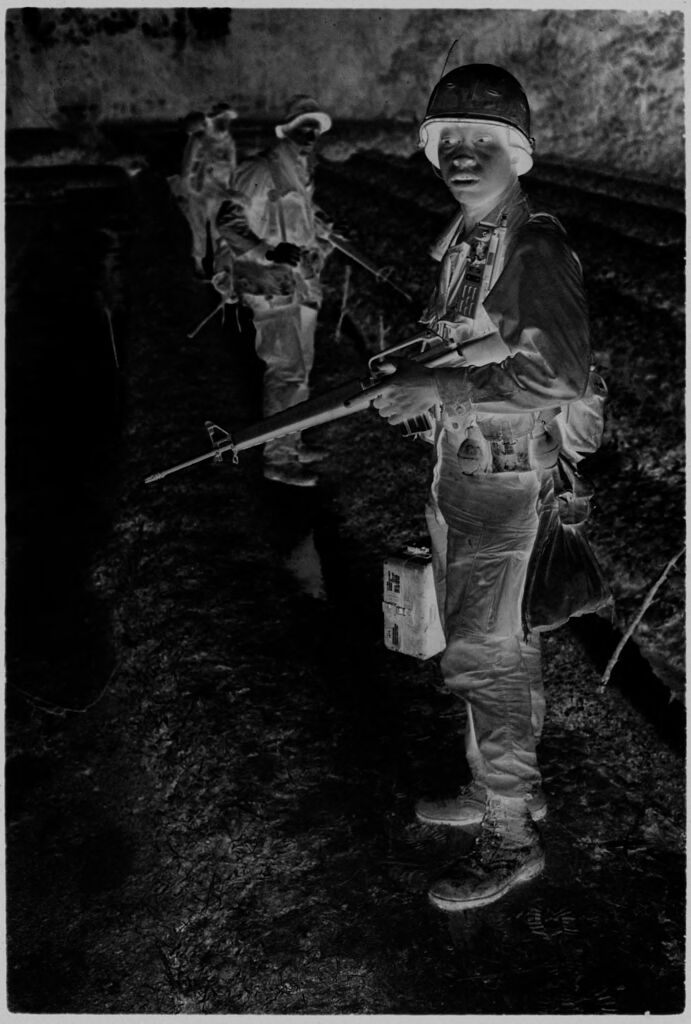 Untitled (Soldiers In Combat Attire Standing In Field, Vietnam)