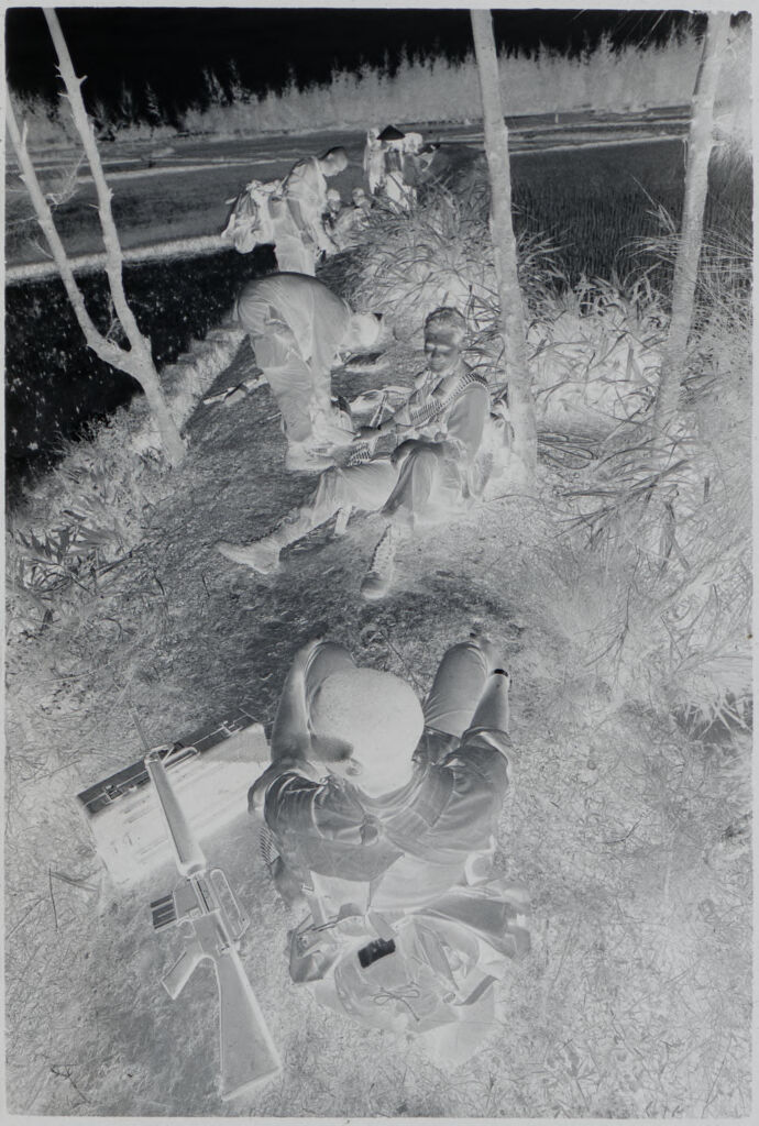 Untitled (Soldiers Stopped To Rest Along Side Of Path, Vietnam)