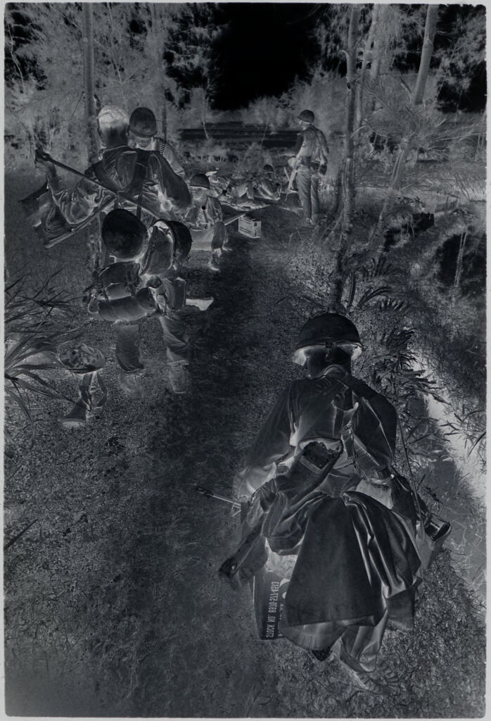 Untitled (Soldiers Stopping To Rest Along Side Of Path, Vietnam)