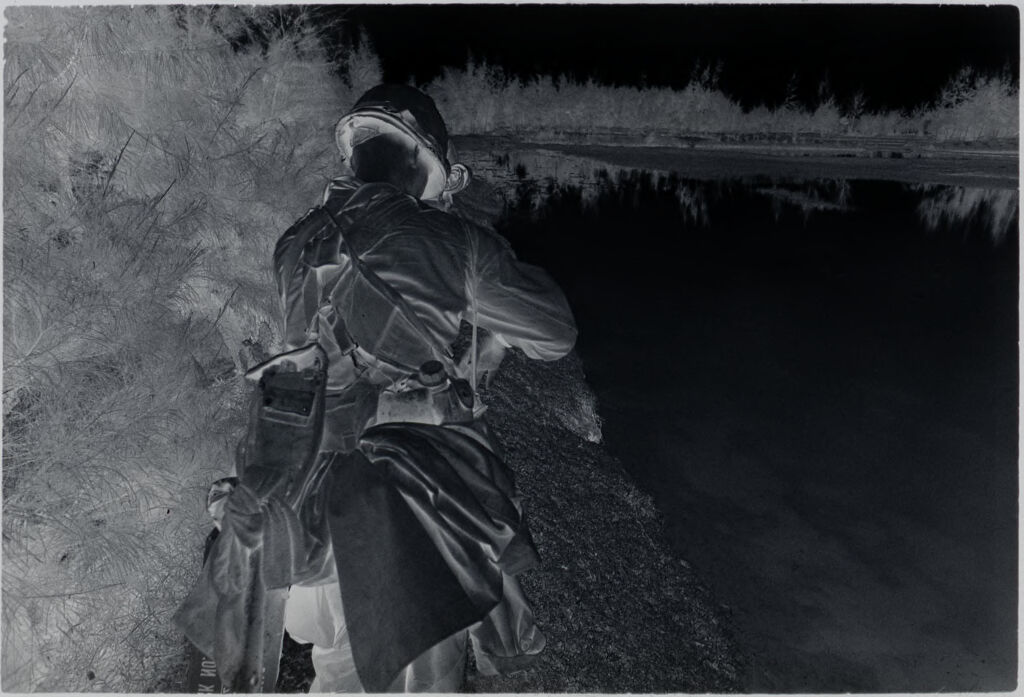 Untitled (Soldier Walking On Path Next To River(?), Vietnam)