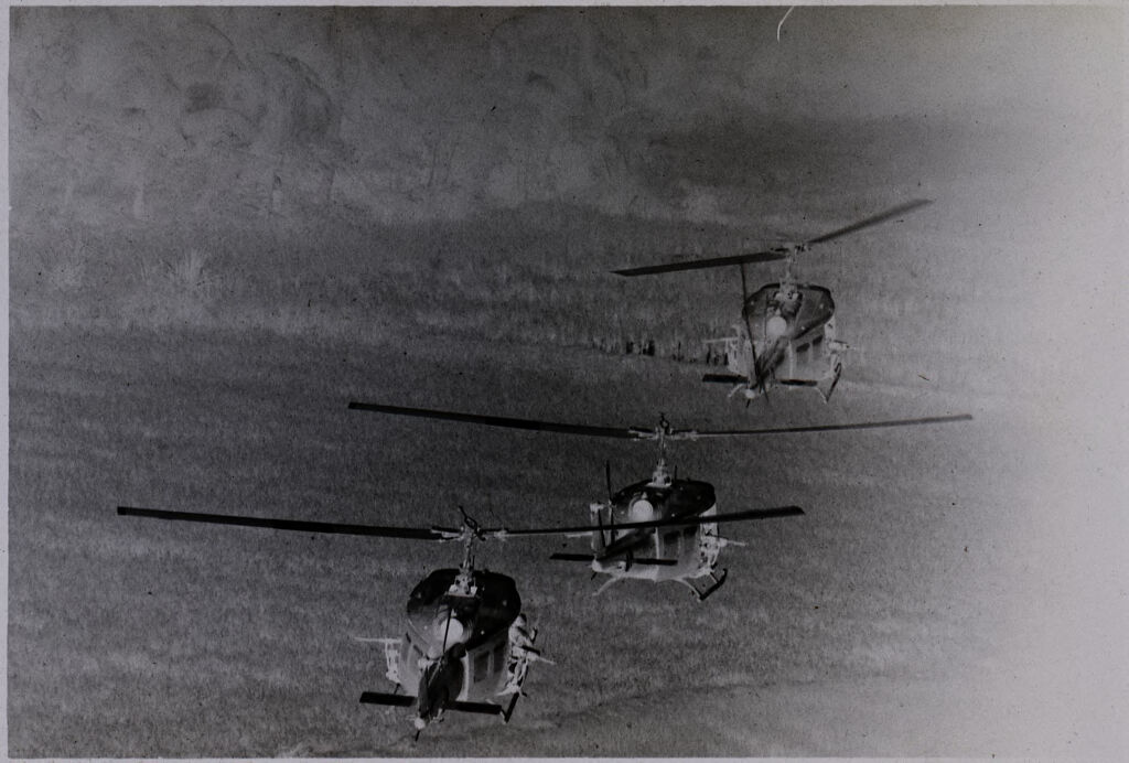 Untitled (Aerial View Of Helicopters Flying Over Field, Vietnam)