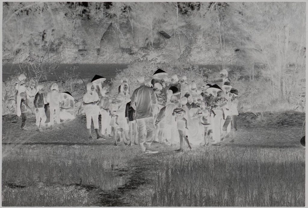 Untitled (Soldiers With Vietnamese Women And Children In Field, Vietnam)