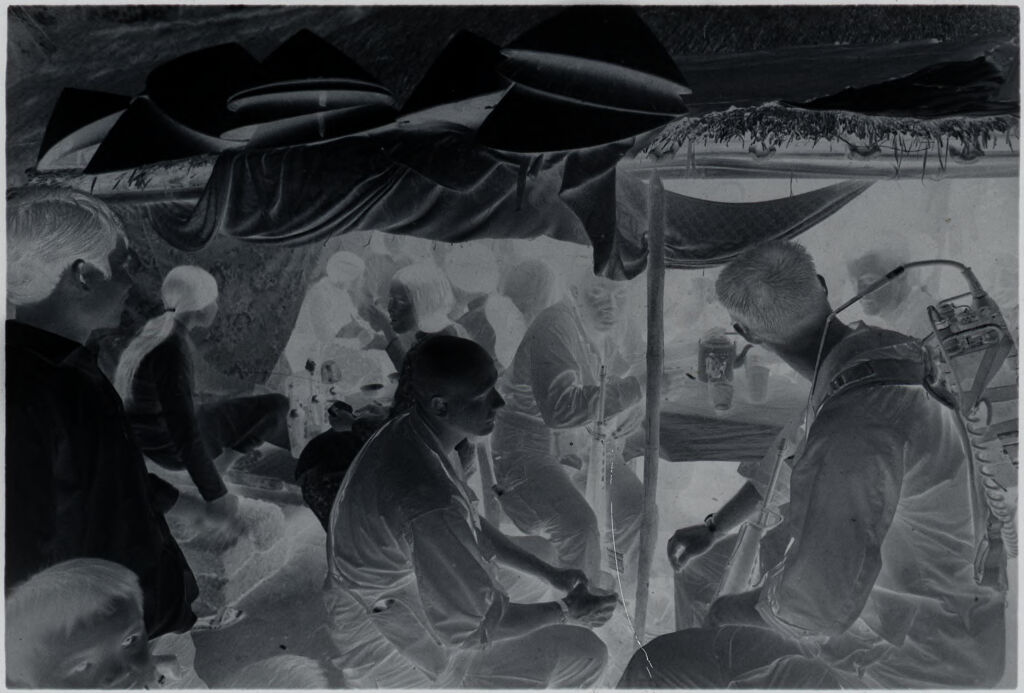 Untitled (Soldiers Taking A Break In Dining Tent, Vietnam)