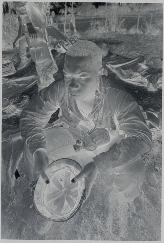 Untitled (Soldier Resting In Rice Paddy, Vietnam)